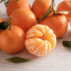 A group of clementines, with one partially peeled, revealing the segments.