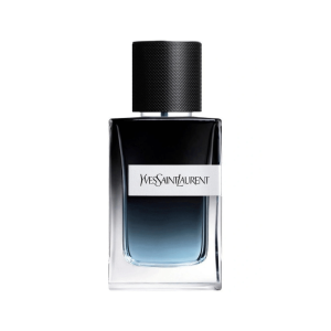 A photo of a bottle of Yves Saint Laurent Y Eau de Parfum next to its dark blue and black box with a large white 'Y' logo. The bottle is clear at the bottom with a blue liquid that fades into a dark, opaque top. The YSL logo is on the bottle in white.