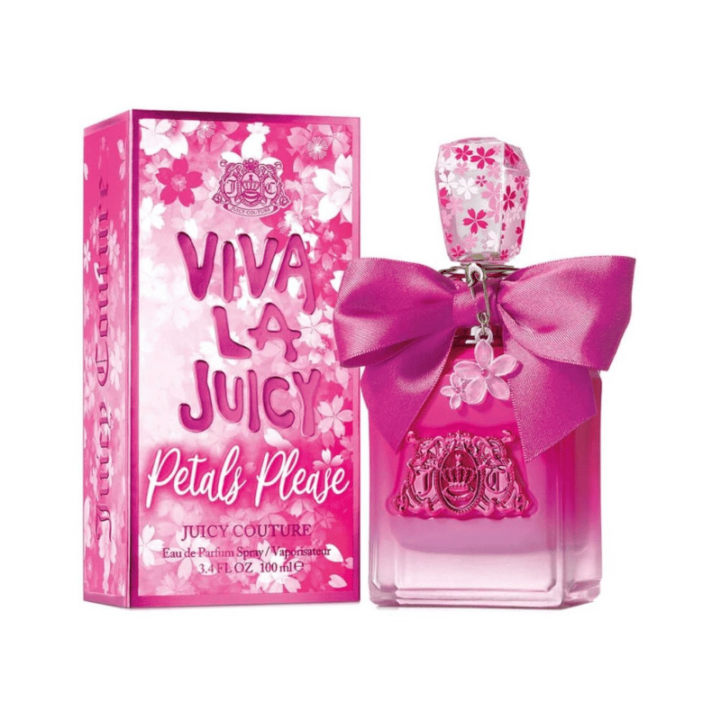 The Juicy Couture Viva La Juicy Petals Please 100ml perfume bottle next to its matching pink box. The bottle features a large pink bow and a floral charm, while the box is covered in a vibrant floral pattern.