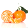 A whole mandarin orange, a partially peeled mandarin, and several mandarin orange segments are arranged on a reflective white surface.