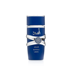 Blue cylindrical perfume bottle of Lattafa Asad Zanzibar with silver Arabic script and metallic criss-cross band design around the center, featuring an ornate circular medallion.