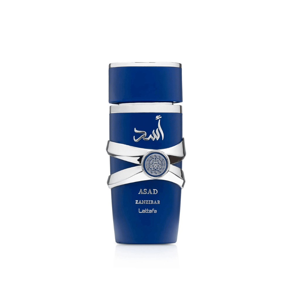 Blue cylindrical perfume bottle of Lattafa Asad Zanzibar with silver Arabic script and metallic criss-cross band design around the center, featuring an ornate circular medallion.