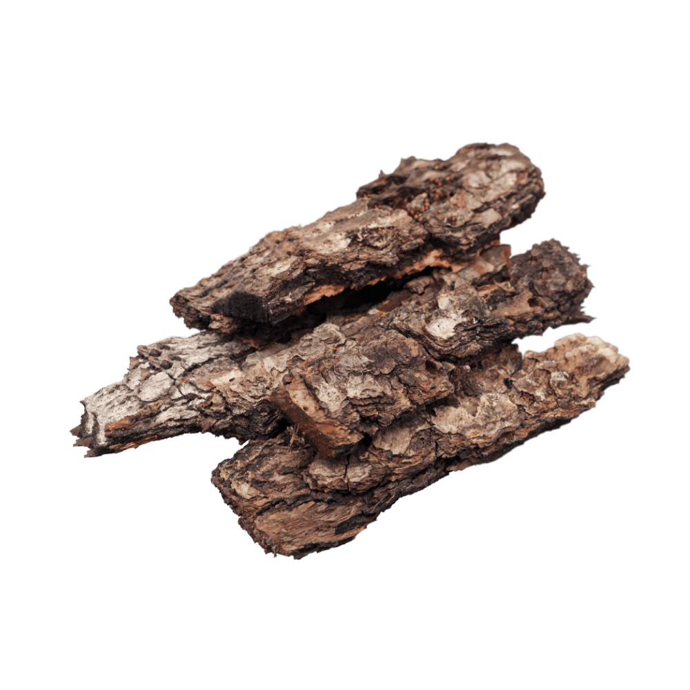 Pile of rough tree bark pieces with brown, textured surfaces stacked together